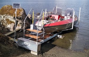 Easyboatroller båtslip med en Buster L på en sandstrand